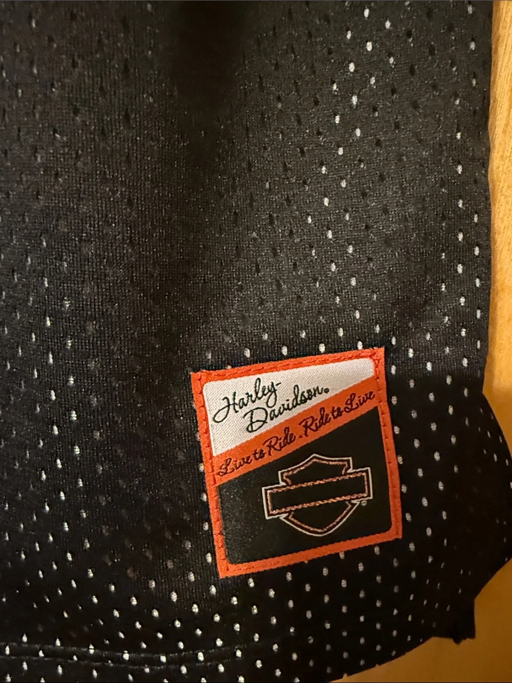 Harley-Davidson Black Jersey with Orange and White Sleeve Stripes from Peoria AZ